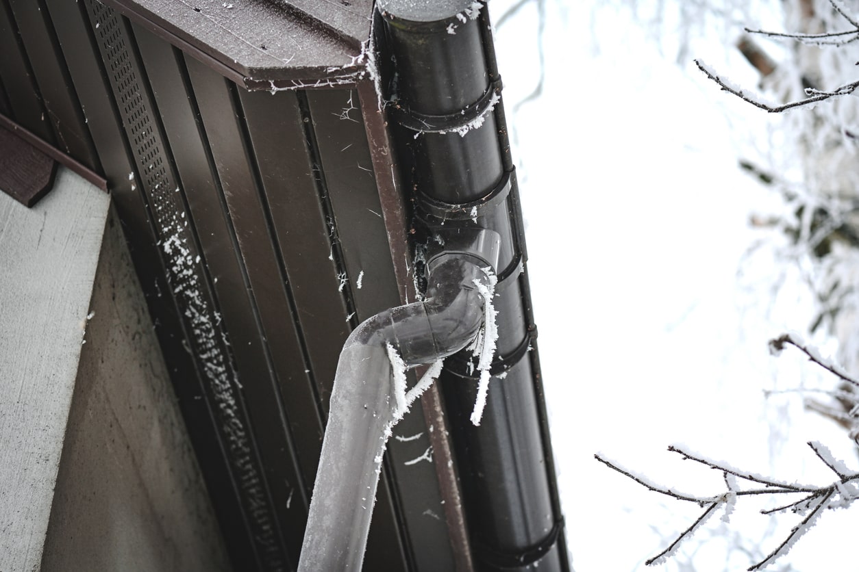frozen gutter pipes in winter